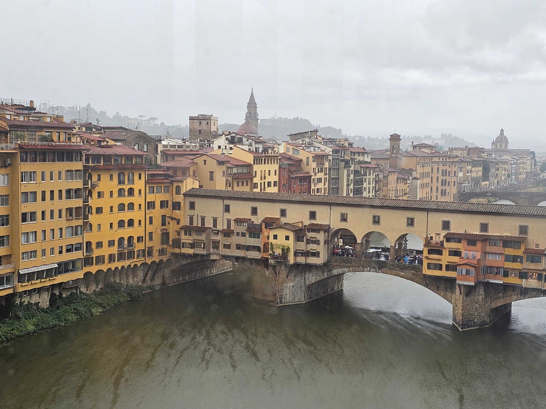 Ponte Vecchio over the Arno in Florence on a rainy day