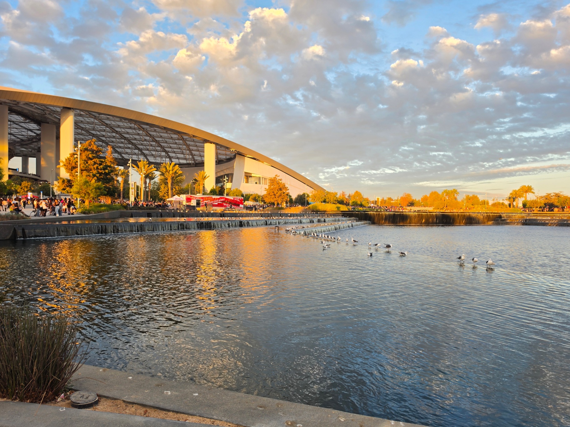 Golden evening light on the stadium reflecting pools